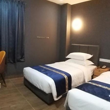 Good 9 Hotel - Cahaya Kota Puteri Пасир Гуданг Екстериор снимка